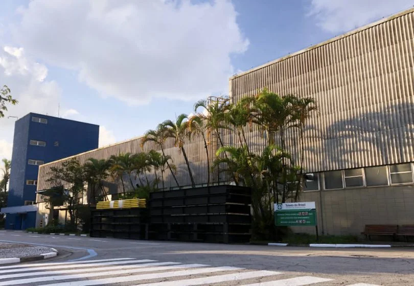 Brazil manufacturing facility exterior with palm trees